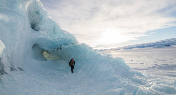  An explorer walking on an iceberg